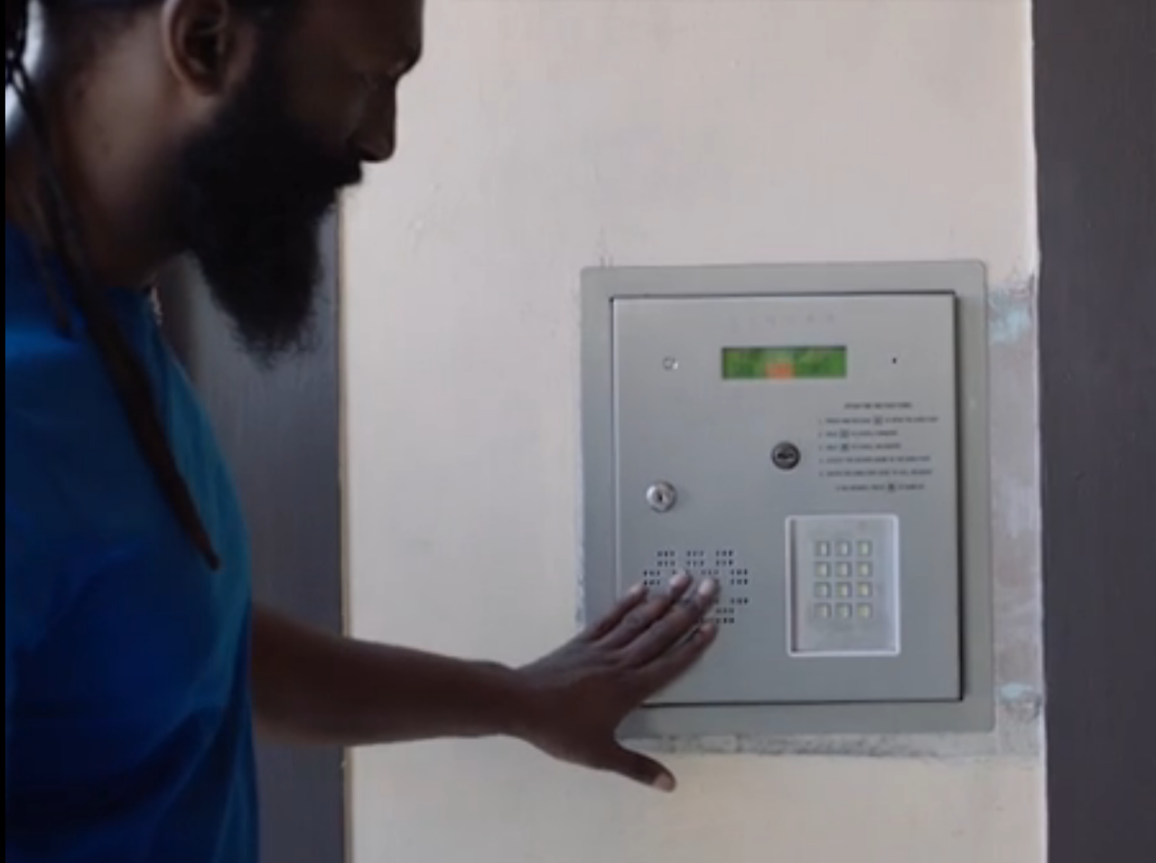 The deaf person trying to use intercom door